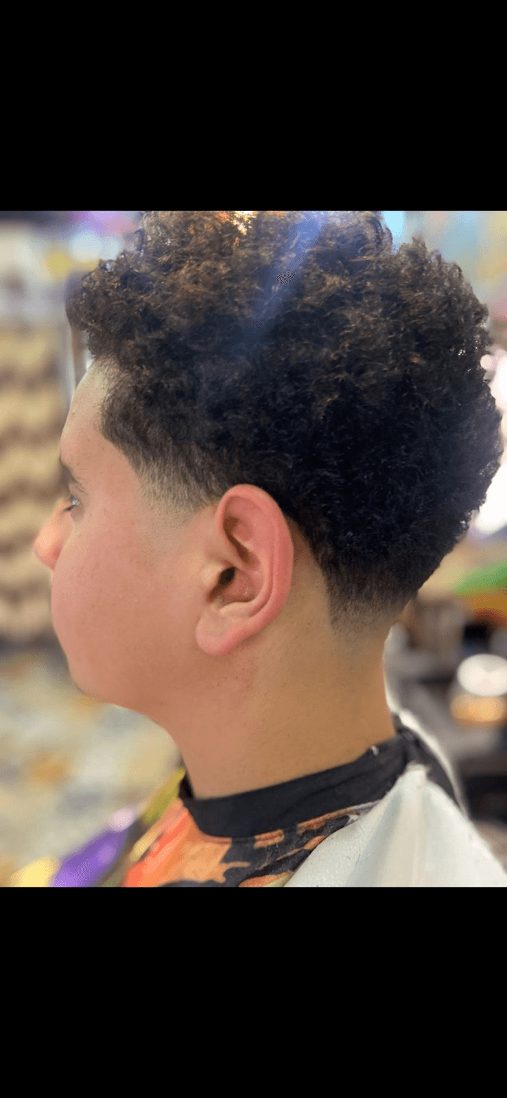 Mullet cacheado com degradê em Novo Osasco